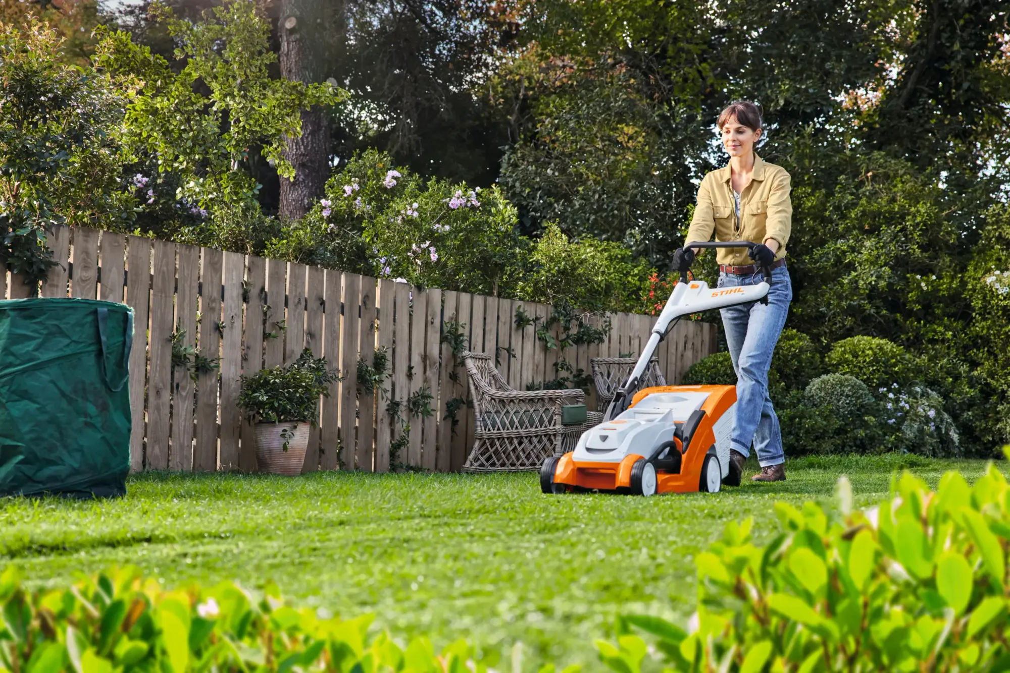 Lawn mower being diagnosed and repaired with common tools and parts